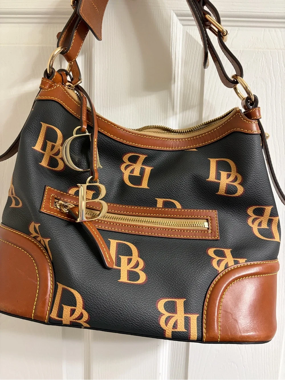 Dooney & Bourke Black and Brown DB Logo Hobo with Gold Hardware